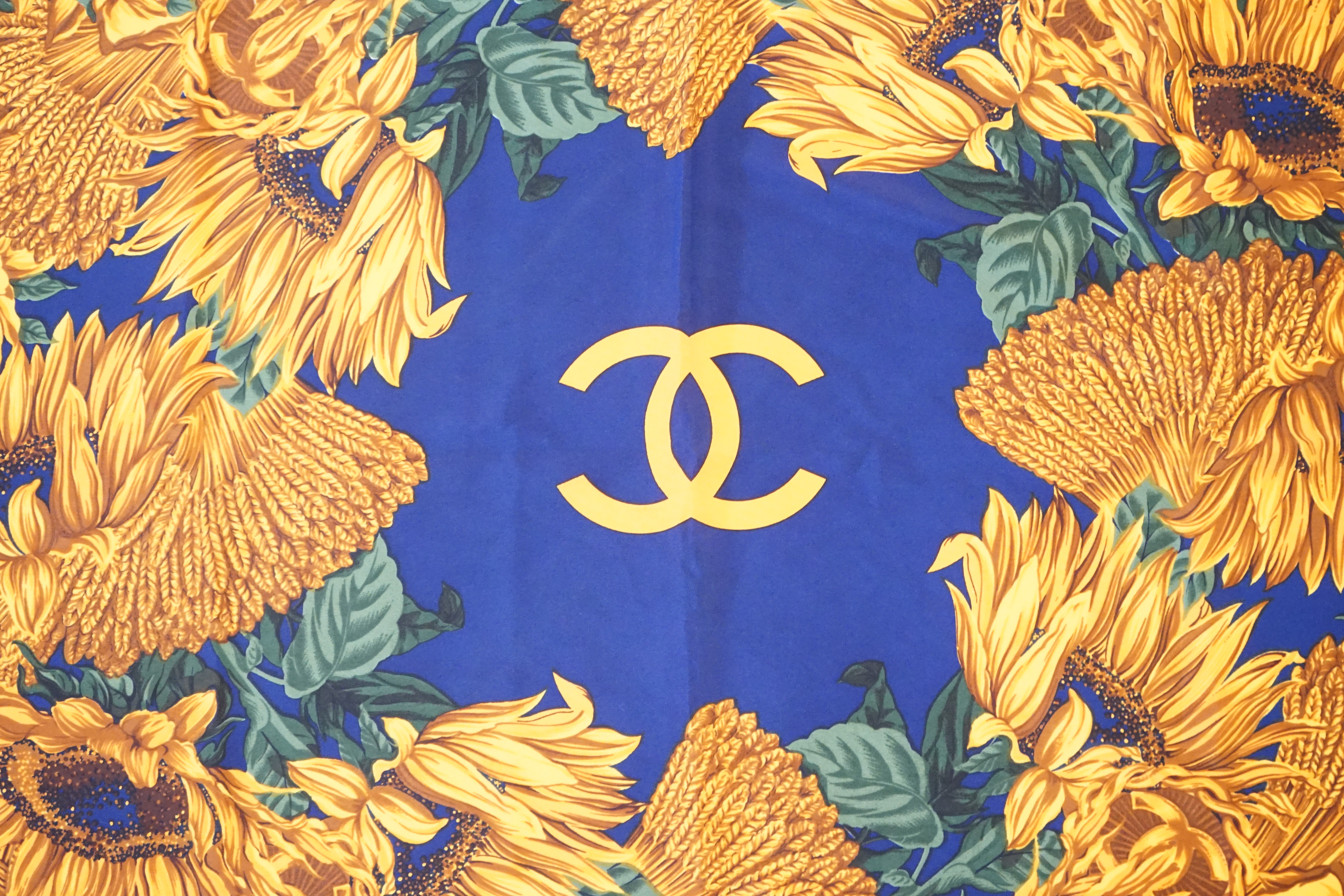 A Vintage Chanel Logo Floral Sunflowers silk scarf, width 86.5cm, height 87.5cm